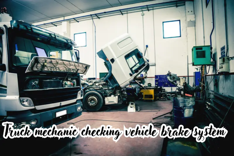 truck mechanic checking vehicle brake system